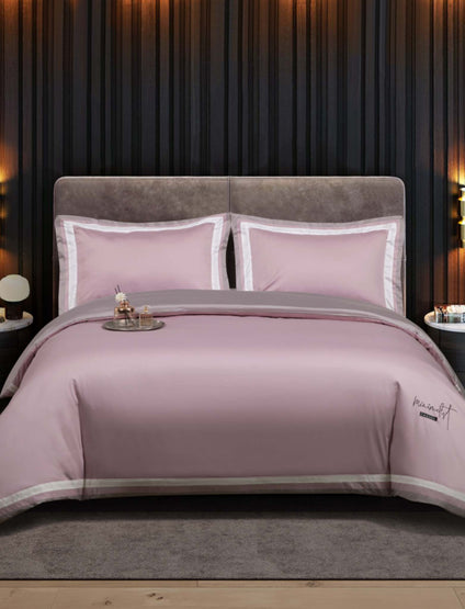 Aulaire 60s 3-piece Duvet Cover and Pillowcase Set. Signature Collection Long Staple Cotton. Mauve top and white border, with grey underside.