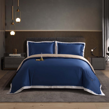 Aulaire 60s 3-piece Duvet Cover and Pillowcase Set. Signature Collection Long Staple Cotton. Royal blue top and white border, with fawn underside.