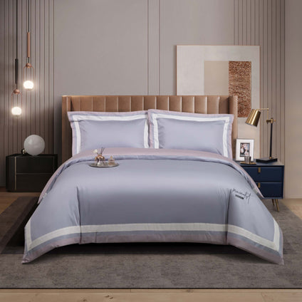 Aulaire 60s 3-piece Duvet Cover and Pillowcase Set. Signature Collection Long Staple Cotton. Grey top with pink, grey and white border. Pink underside.
