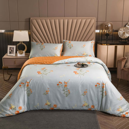 Aulaire 100s 3-piece Duvet Cover and Pillowcase Set. Deluxe Printed Cotton. Pale blue fabric with orange flowers.